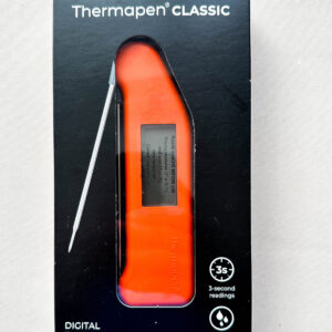 Orange plastic thermometer with foldable probe and digital display screen